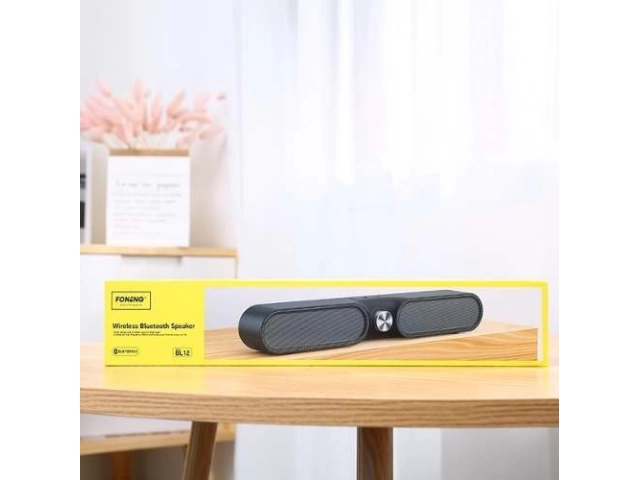 Parlante Foneng BL12 10W animando una reunión en Uruguay, comprá tu altavoz Bluetooth en Avlis