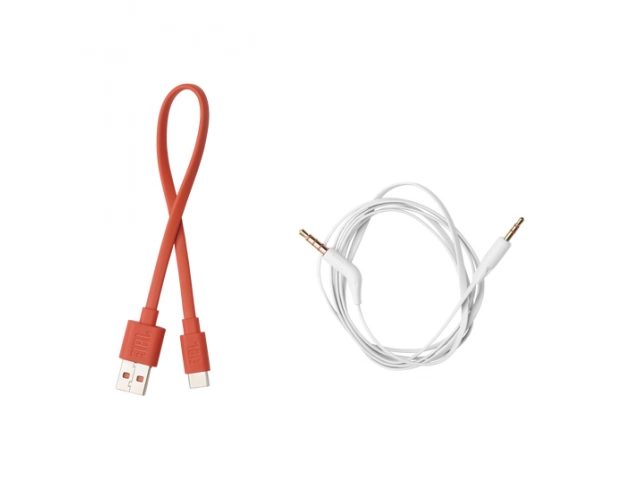 Contenido completo de la caja JBL Tune 770 BT White con cargador y manual.