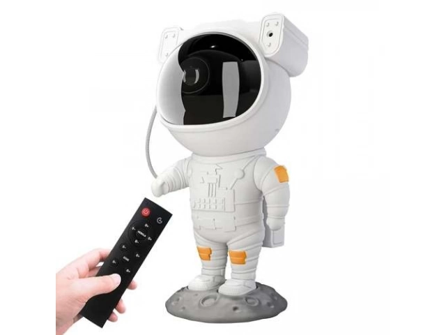 Lámpara proyector astronauta funcionando como luz de noche en una habitación infantil, creando un cielo estrellado. El regalo perfecto de Avlis Uruguay.