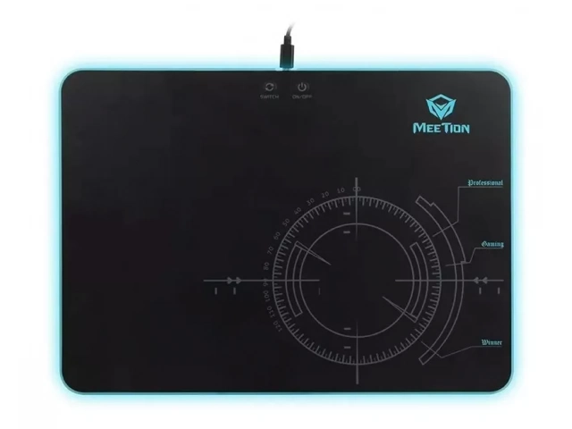 MousePad Meetion MT-P010 sobre un escritorio, mostrando su tamaño ideal para gaming y trabajo en Uruguay.