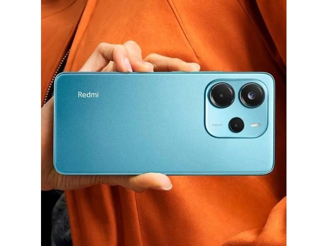 Altavoces estéreo del Xiaomi Redmi Note 14 azul brindando audio de alta calidad.